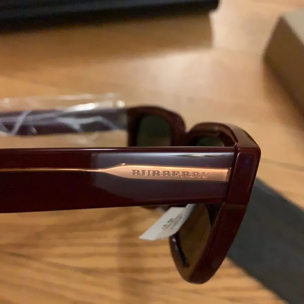 Burberry Bordeaux square sunglasses. New, with tags and case. In box.